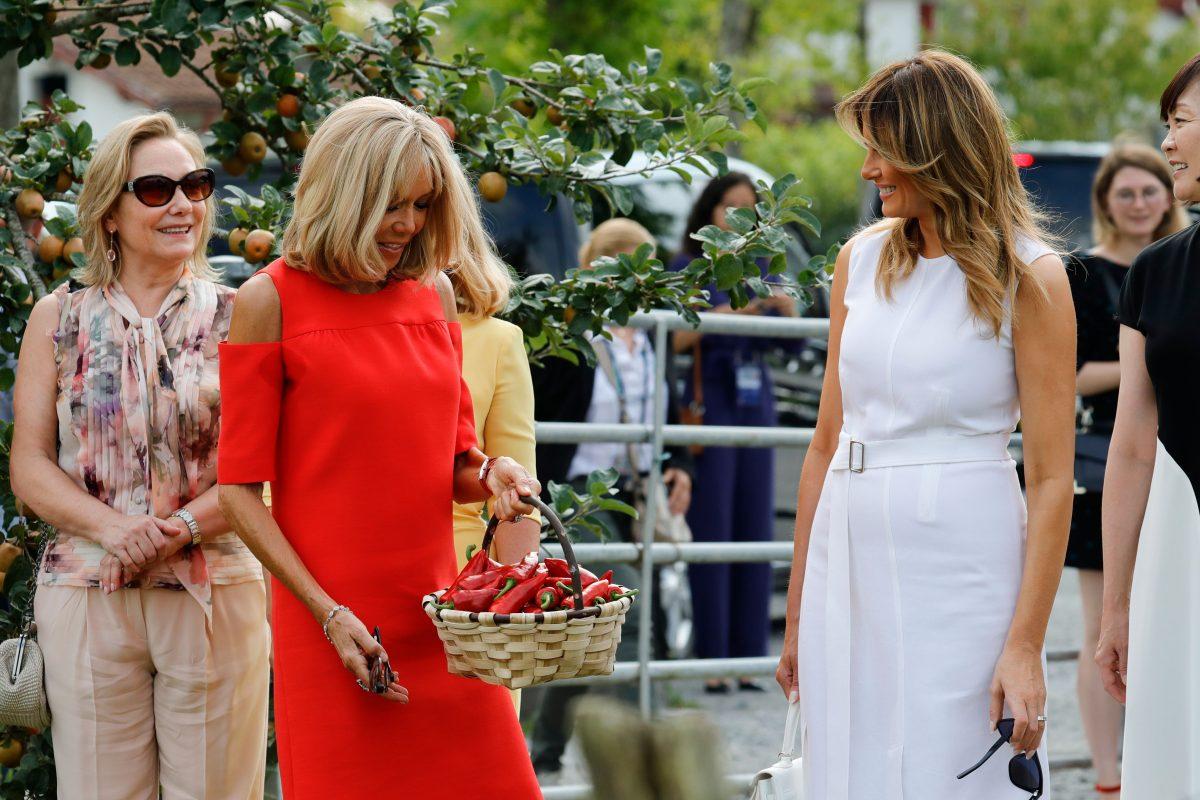 Wife of French President Brigitte Macron (2nd L) holds a basket of Espelette peppers next to Chile's First Lady Cecilia Morel (L) and U.S. First Lady Melania Trump (R) as they take part in a tour on traditional Basque culture in Espelette, near Biarritz as part of the G7 summit, on Aug. 25, 2019. (Thomas Samson/AFP/Getty Images)