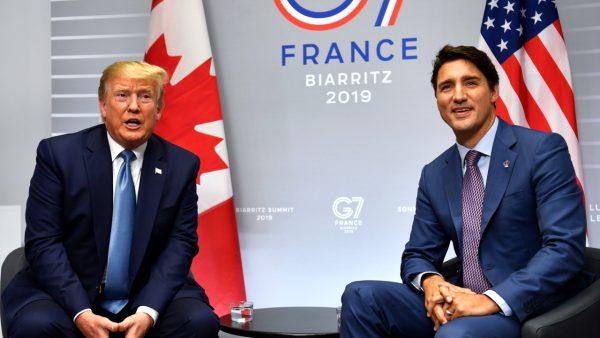 President Donald Trump (L) and Canada's Prime Minister Justin Trudeau pose as they take part in a bilateral meeting at the Bellevue centre in Biarritz, south-west France on the second day of the annual G7 Summit attended by the leaders of the world's seven richest democracies, Britain, Canada, France, Germany, Italy, Japan, and the United States on Aug. 25, 2019. (Nicholas Kamm/AFP/Getty Images)