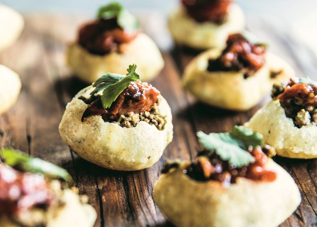Shepherd's Indian "puffy tacos," his take on pani puri, with Auntie's fresh masala. (Julie Soefer)