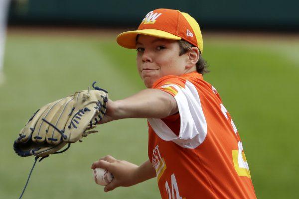 River Ridge, Louisiana's Egan Prather delivers in the second inning of the Little League World Series Championship game against Curacao in South Williamsport, Pa., on Aug. 25, 2019. (AP Photo/Gene J. Puskar)