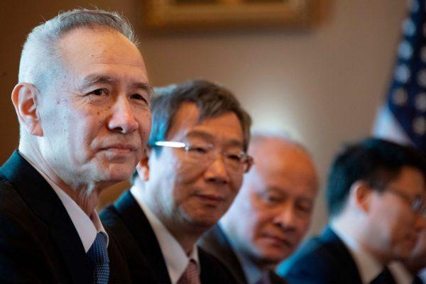 The Chinese Delegation, including Vice Premier Liu He (L) and Governor of the People's Bank of China Yi Gang (2nd L) looks on during U.S.-China Trade Talks in Washington on Jan. 30, 2019. (Jim Watson/AFP/Getty Images)