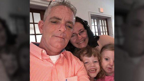David Ireland (L) and members of his family. Ireland has undergone three operations to remove about 25 percent of his skin after contracting flesh-eating bacteria, his wife said. (GoFundMe)