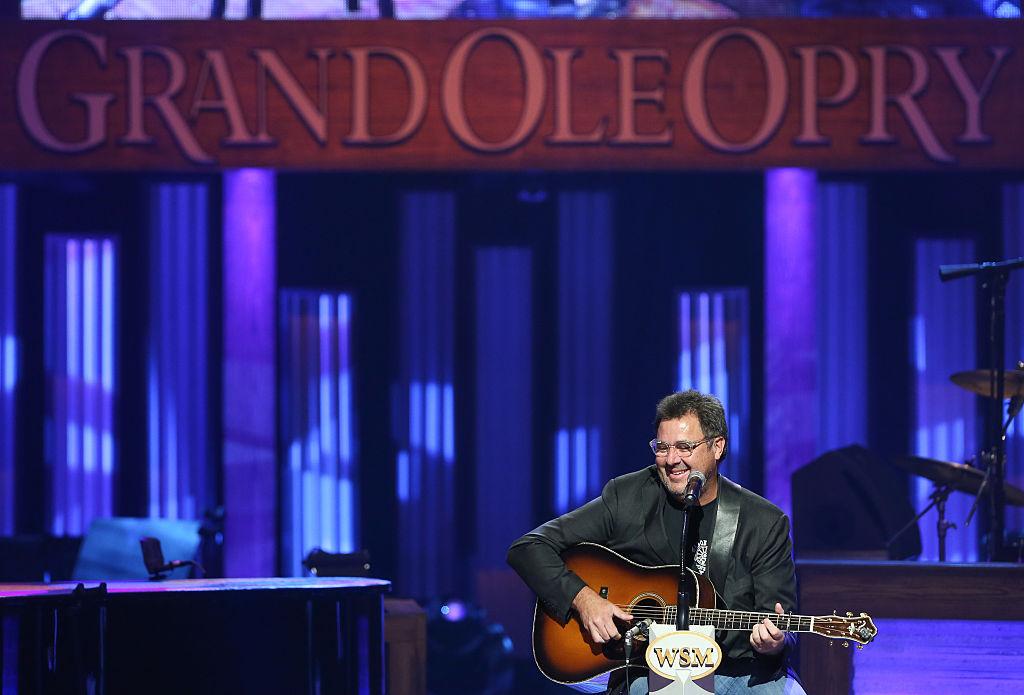 Singer-songwriter Vince Gill performs at Little Big Town's induction into The Grand Ole Opry in Nashville on Oct. 17, 2014. (Terry Wyatt/Getty Images)