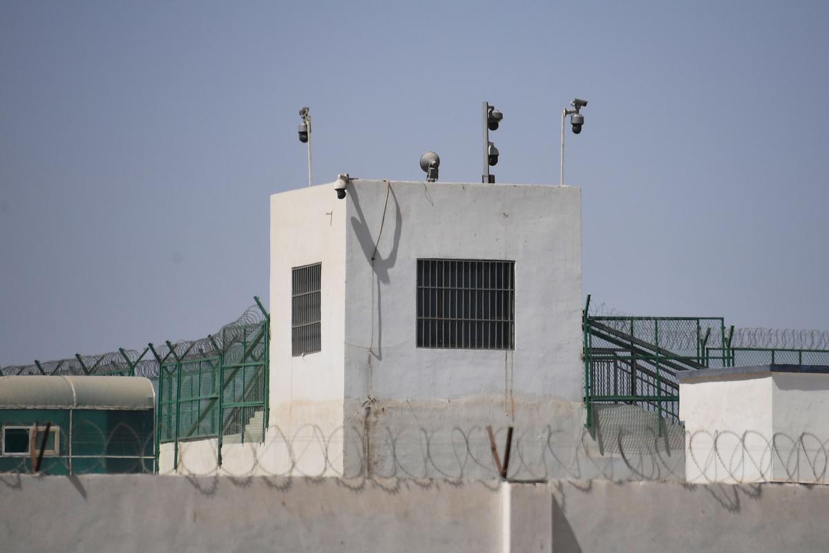 The outer wall of a complex which includes what is believed to be a re-education camp on the outskirts of Hotan, in China's northwestern Xinjiang region on May 31, 2019. (Greg Baker/AFP/Getty Images)