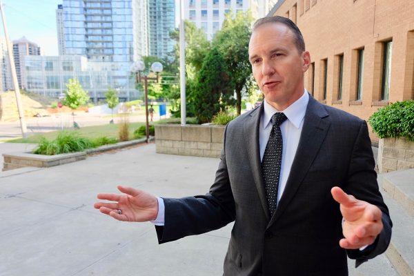 Detective Corey Jones speaks about the arrest of suspect Fabio Guerrieri outside the Ontario Court of Justice in North York, Ont., on Aug. 26, 2019. (Becky Zhou/The Epoch Times)