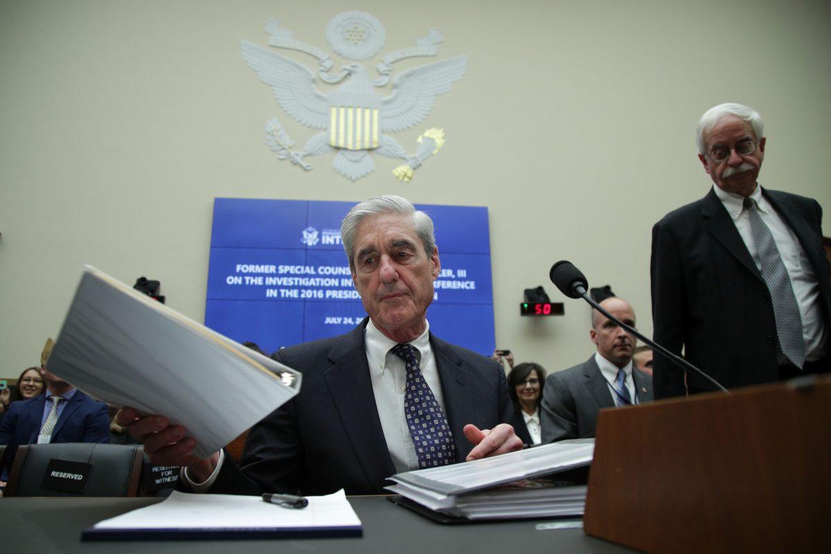 Former special counsel Robert Mueller waits to testify before the House Intelligence Committee about his report on Russian interference in the 2016 presidential election in the Rayburn House Office Building in Washington on July 24, 2019. (Alex Wong/Getty Images)