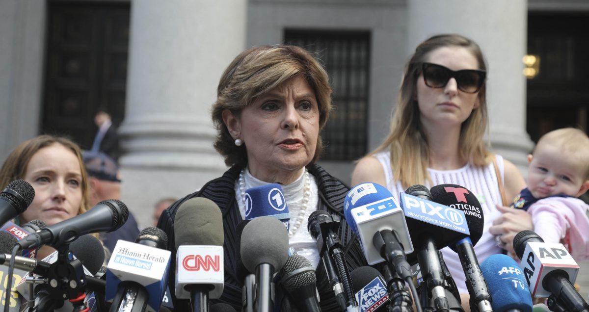 Attorney Gloria Allred (C), flanked by two of her clients, speaks during a news conference after leaving a Manhattan court where sexual victims, on the invitation of a judge, addressed a hearing after the accused Jeffrey Epstein killed himself before facing sex trafficking charges in New York on Aug. 27, 2019. (Bebeto Matthews/AP Photo)