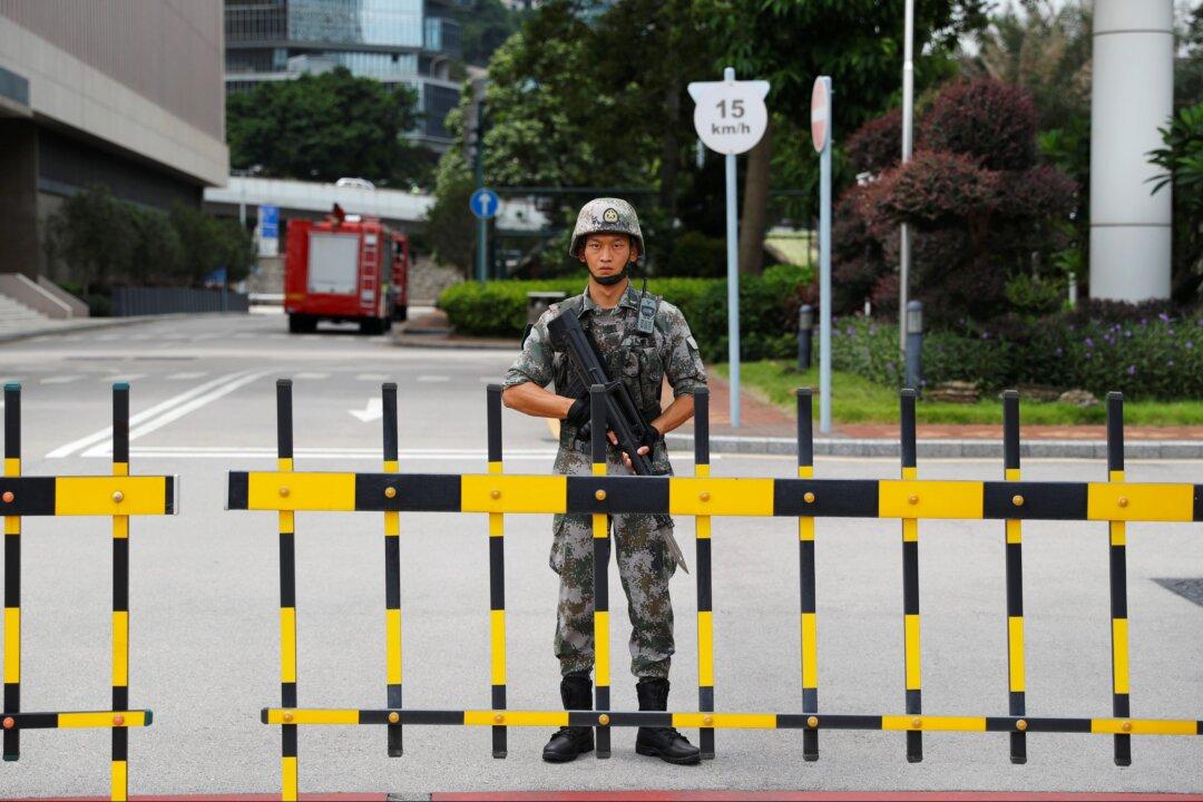 China Rotates Troops at Hong Kong and Macau Borders