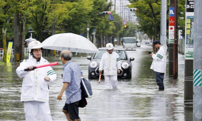 Record Rain in South Japan Brings Flood Chaos