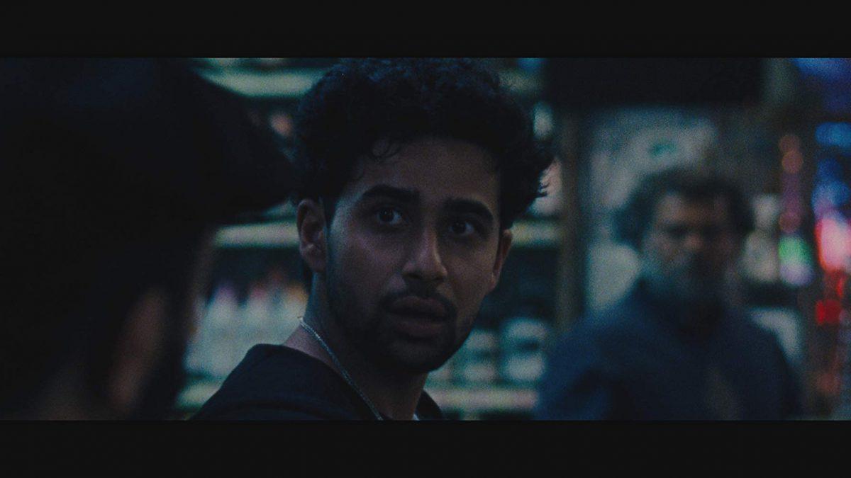 Suraj Sharma as the contact who sets up the big drug deal, in “Killerman.” (Blue Fox Entertainment)