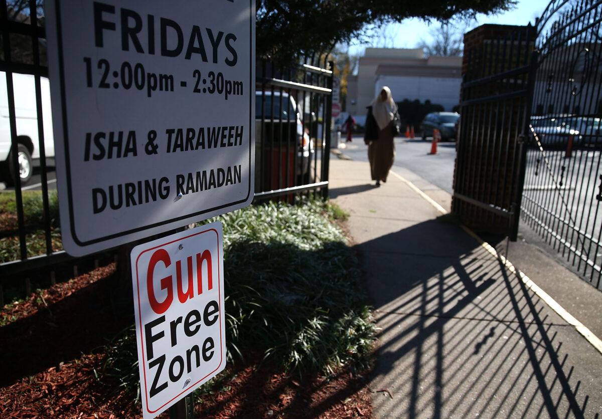 A sign reads Gun Free Zone at the entrance to the Dar Al-Hijrah Mosque, Dec. 4, 2015, in Falls Church, Va. (Mark Wilson/Getty Images)