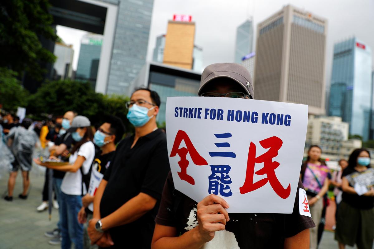 People take part in a general strike at Tamar Park in Hong Kong, China on Sept. 2, 2019. (Kai Pfaffenbach/Reuters)