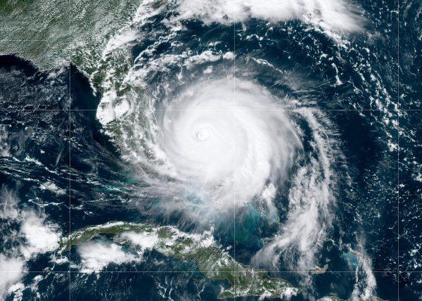 In this NOAA GOES-East satellite handout image, Hurricane Dorian, now a Cat. 4 storm, ambled past Grand Bahama Island on Sept. 2. (NOAA via Getty Images)