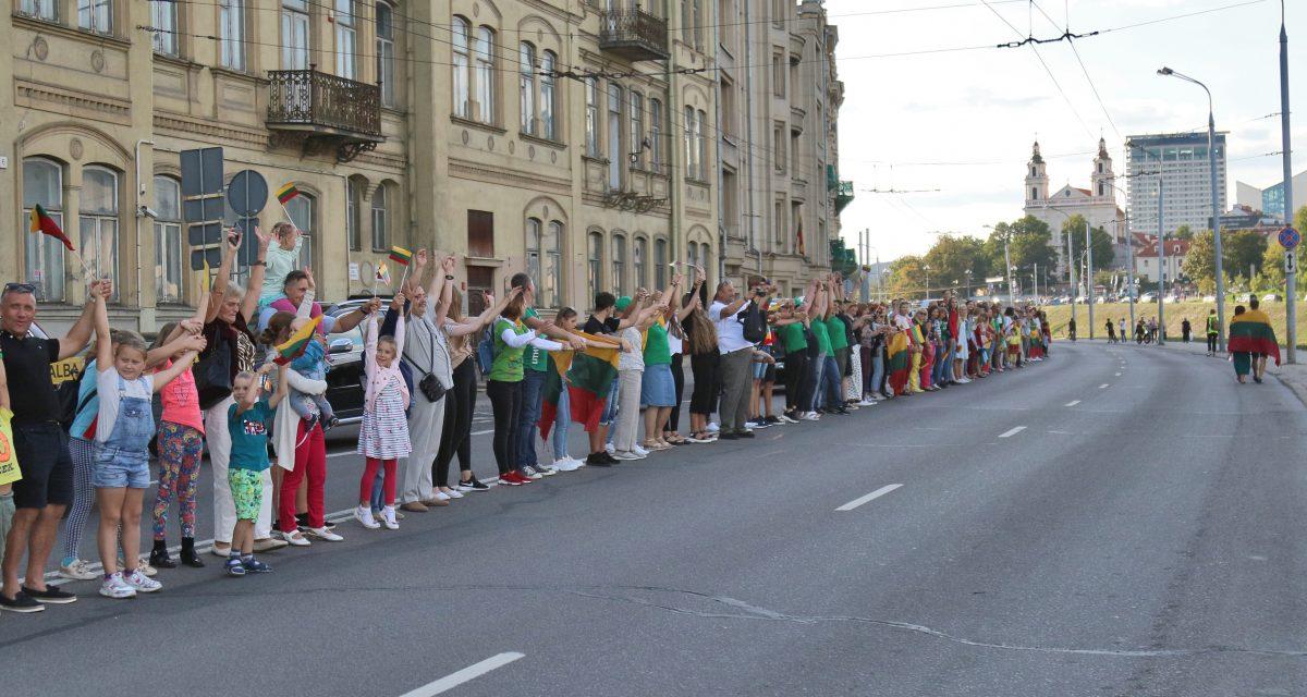 People form a human chain under the motto "The Baltic Way—It's Us" from Gediminas Tower to the City Limits in Vilnius, Lithuania, on Aug. 23, 2019. From Catalan separatists to Hong Kong pro-democracy activists, the human chain that helped the Baltic states win independence from the Soviet Union three decades ago still inspires freedom-seekers the world over. (Petras Malukas/AFP/Getty Images)