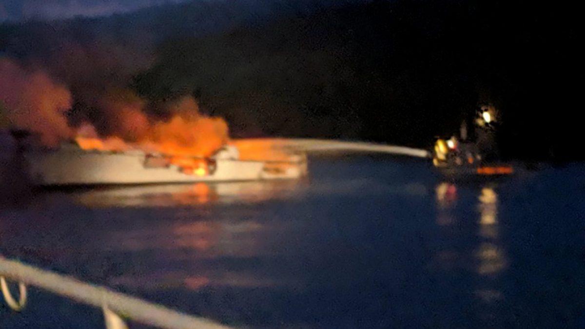 Firefighters work to extinguish a dive boat engulfed in flames after a deadly fire broke out aboard the commercial scuba diving vessel off the Southern California Coast on Sept. 2, 2019. (Santa Barbara County Fire Department via AP)