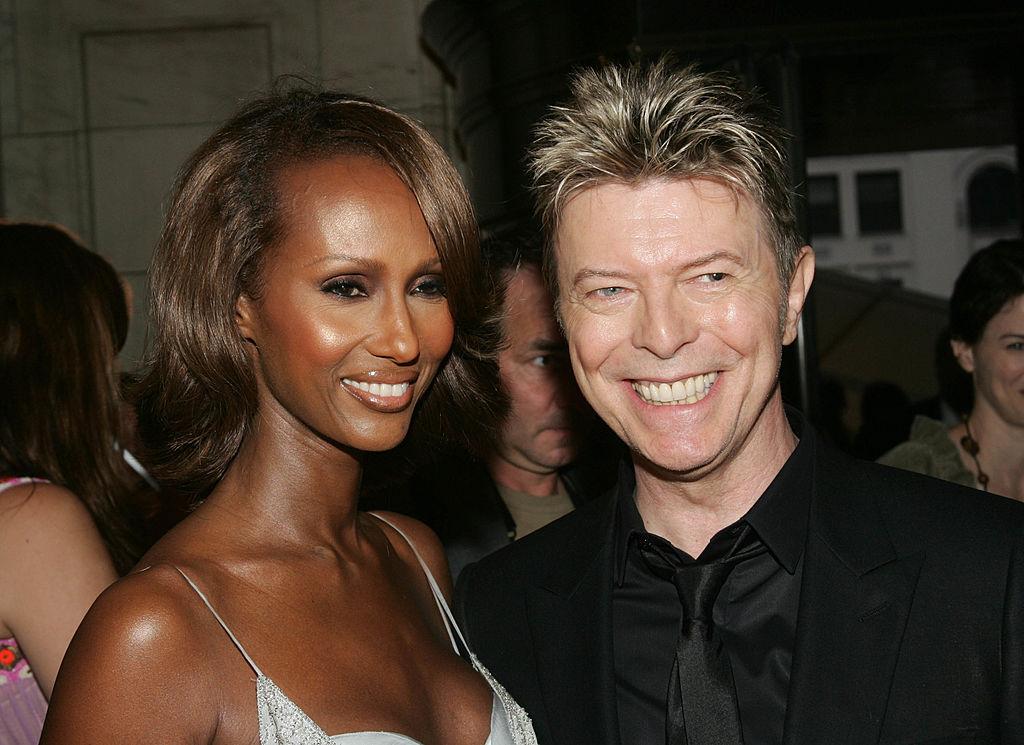 Iman and David Bowie at the CFDA Awards at the New York Public Library on June 6, 2005 (©Getty Images | <a href="https://www.gettyimages.com.au/detail/news-photo/model-iman-and-her-husband-david-bowie-attend-the-2005-cfda-news-photo/53028850">Evan Agostini</a>)