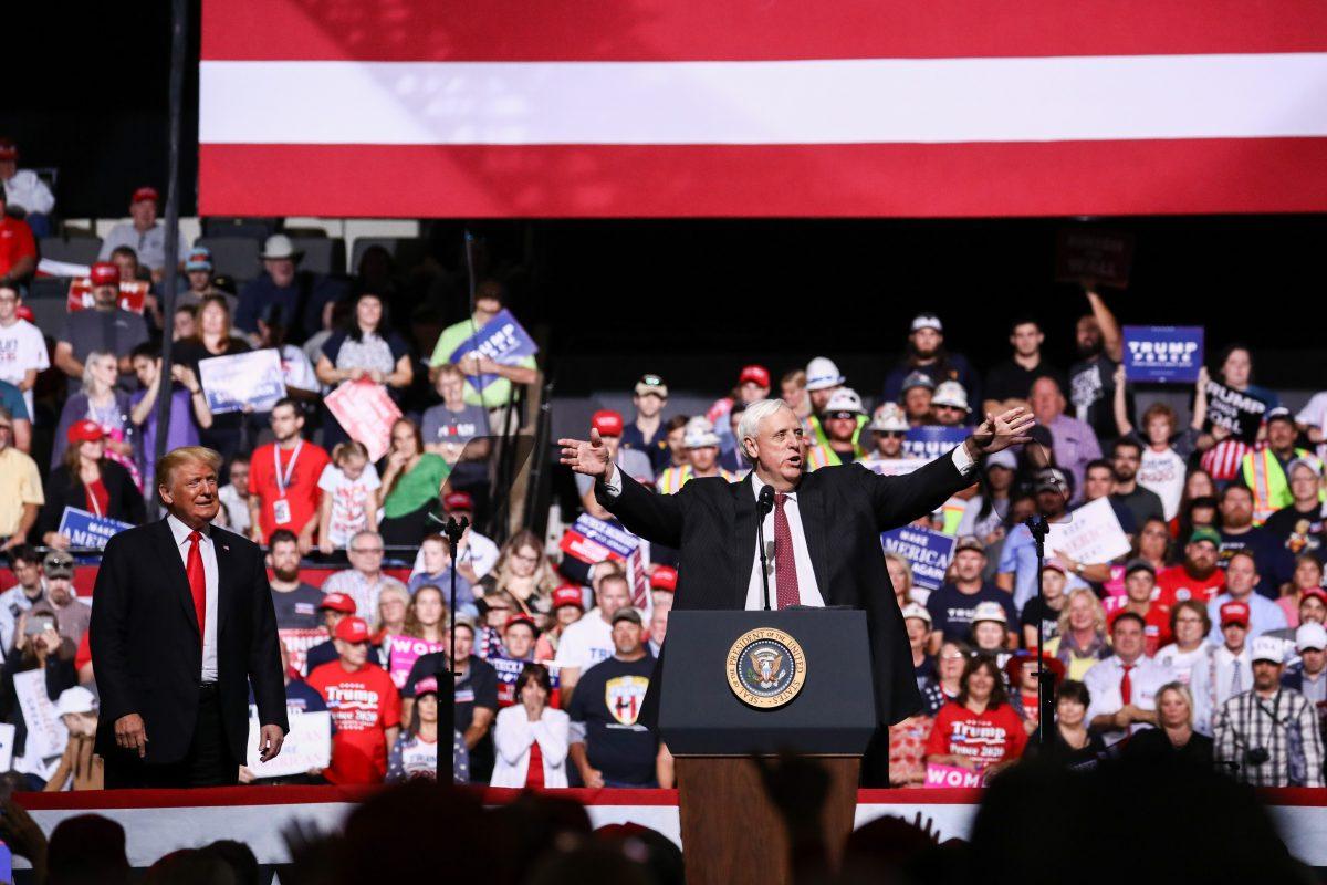 President Donald Trump and West Virginia Gov. Jim Justice at a Make America Great Again rally in Wheeling, W.Va., on Sept. 29, 2018. (Charlotte Cuthbertson The Epoch Times)