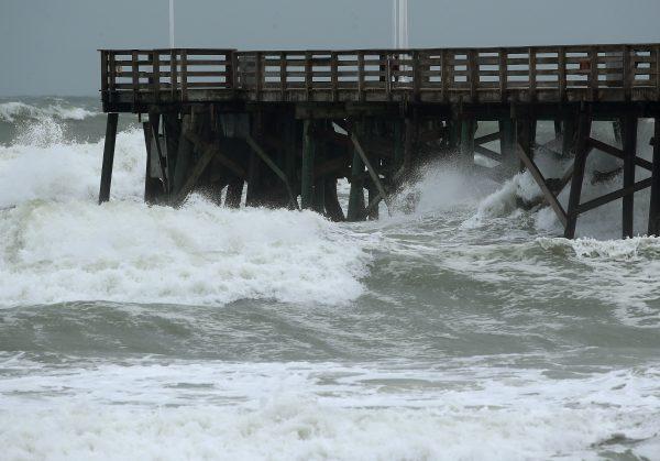 Heavy surf caused by the approach of Hurricane Dorian pounds the boardwalk in Daytona Beach, Fla., on Sept. 3, 2019. (Mark Wilson/Getty Images)