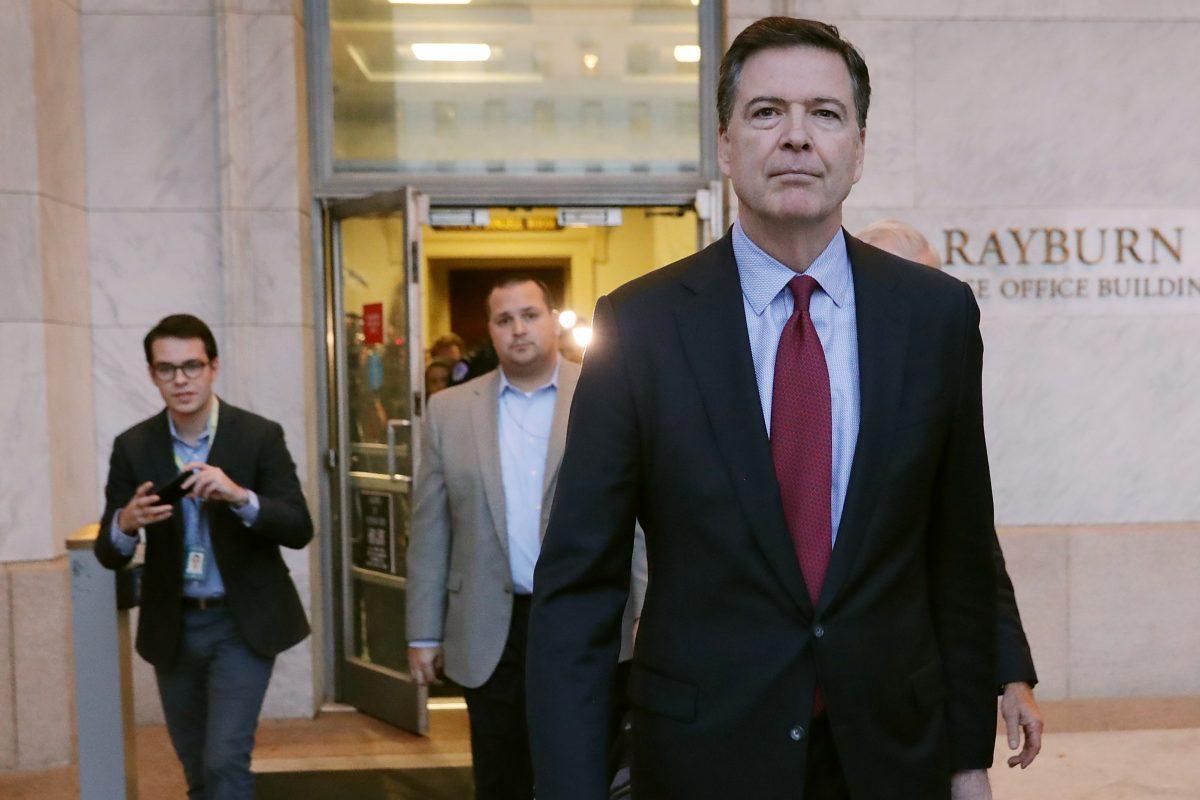 Former Federal Bureau of Investigation Director James Comey leaves the Rayburn House Office Building after testifying to the House Judiciary and Oversight and Government Reform committees on Capitol Hill in Washington on Dec. 7, 2018. (Chip Somodevilla/Getty Images)