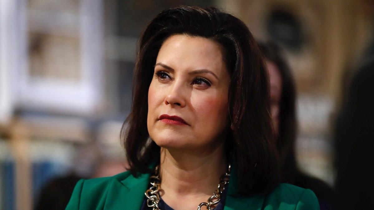 Michigan Gov. Gretchen Whitmer listens to Democratic presidential candidate Sen. Kirsten Gillibrand (D-N.Y.) in Clawson, Michigan, on March 18, 2019. (Paul Sancya/File Photo via AP)