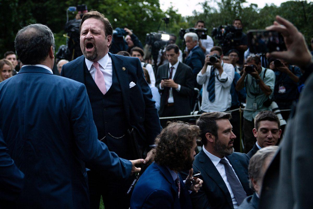 Sebastian Gorka, a former aide to President Donald Trump, responds to Playboy reporter Brian Karem in the Rose Garden at the White House on July 11, 2019. (Brendan Smialowski/Getty Images)
