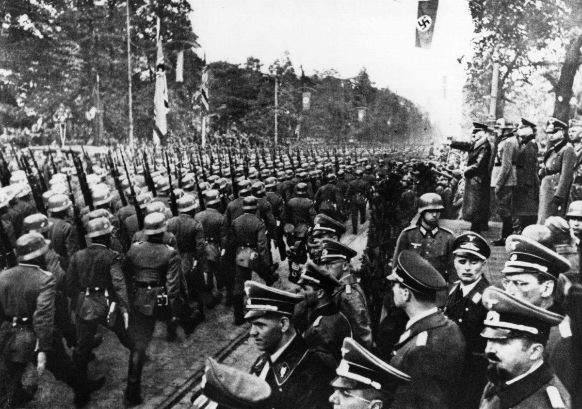 German troops parade in front of Adolf Hitler and Nazi Generals after entry into Warsaw on Oct. 5, 1939. (Keystone/Getty Images)