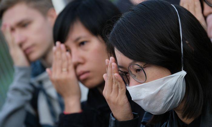 Beijing Unusually Quiet on Hong Kong Bill Withdrawal