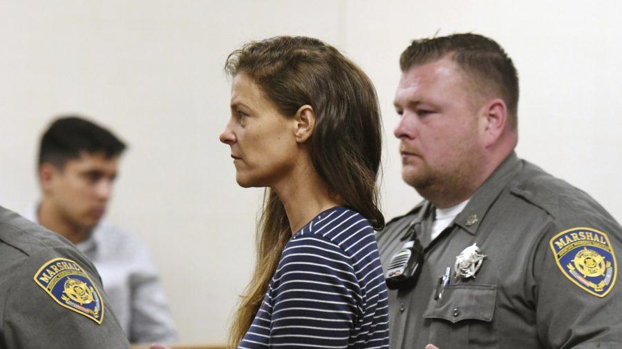 Michelle C. Troconis is arraigned on charges of tampering with or fabricating physical evidence and first-degree hindering prosecution at Norwalk Superior Court in Norwalk, Conn., June 3, 2019. She was later released on bail. (Tyler Sizemore/Hearst Connecticut Media via AP, Pool)