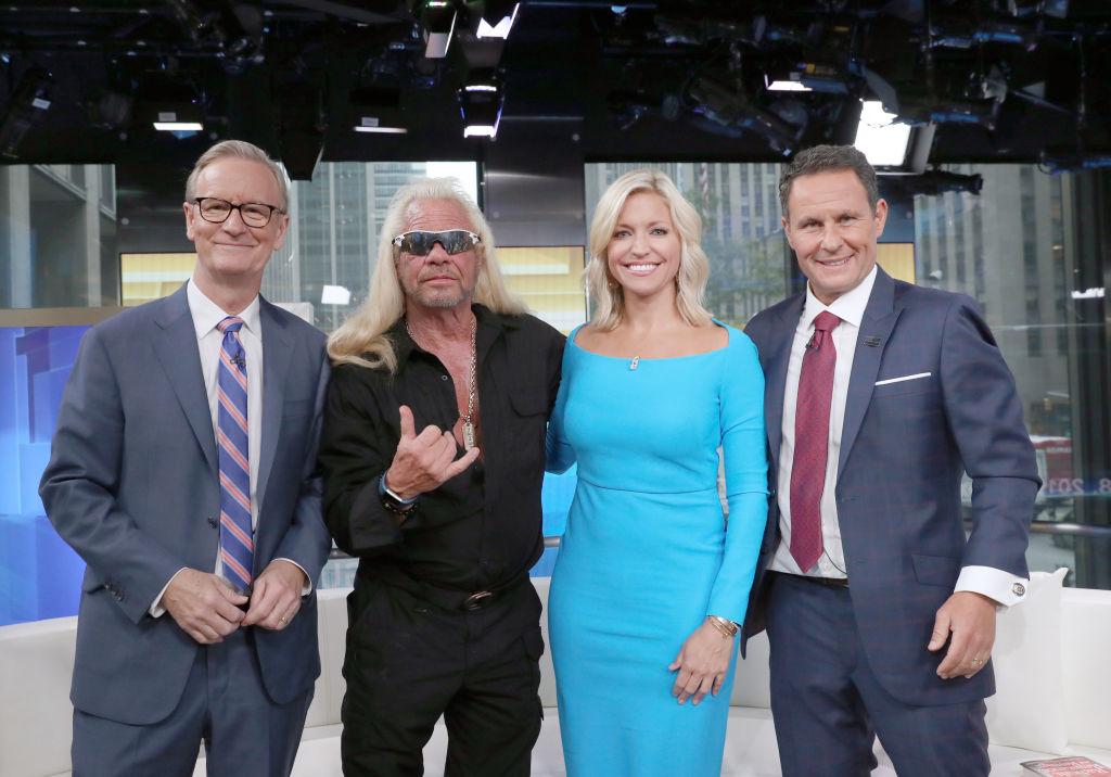 ©Getty Images | <a href="https://www.gettyimages.com/detail/news-photo/steve-doocy-duane-chapman-ainsley-earhardt-and-brian-news-photo/1170717325?adppopup=true">Bennett Raglin</a>