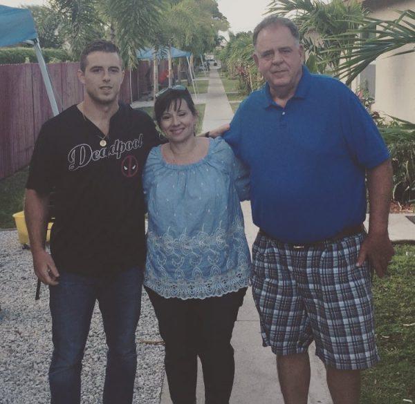 Luke Wollet (L) with his family. (Courtesy of Banyan Treatment Center)