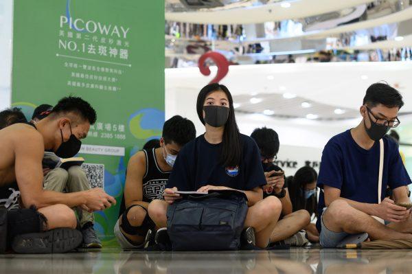 Protesters attend a silent rally inside a shopping mall in Sha Tin district in Hong Kong on Sept. 7, 2019. (Philip Fong/AFP/Getty Images)