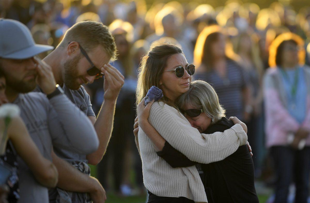 Attendees grieve during a vigil in Santa Barbara, Calif. on Sept. 6, 2019, for the victims who died aboard the dive boat Conception. The Sept. 2 fire took the lives of 34 people on the ship off Santa Cruz Island off the Southern California coast near Santa Barbara. (AP Photo/Mark J. Terrill)