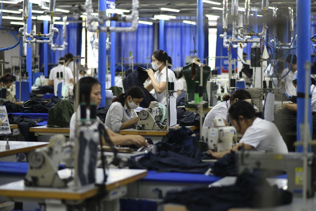 Garment factory workers make men's suits in a factory in Hanoi, Vietnam, on May 24, 2019. (Manan Vatsyayana/AFP/Getty Images)
