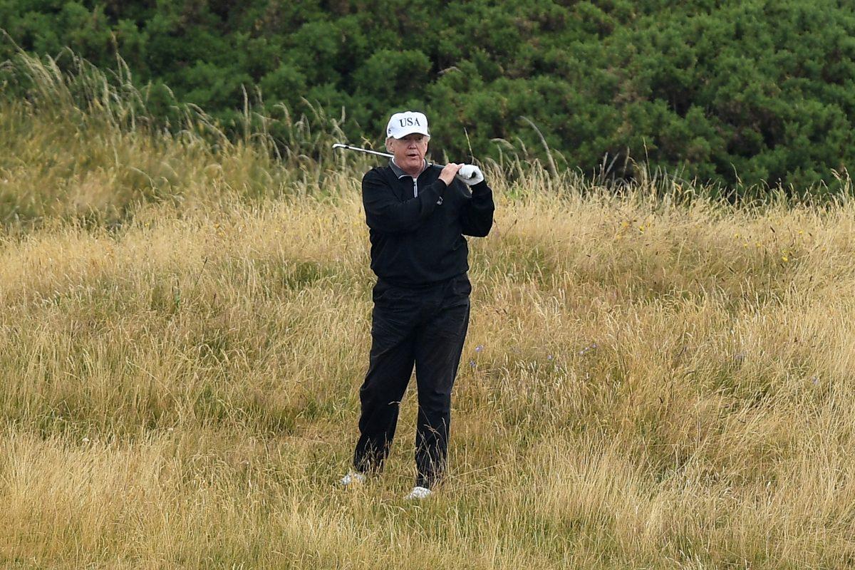 President Donald Trump plays a round of golf at the Trump Turnberry Resort in Scotland in a 2018 file photograph. (Photo by Leon Neal/Getty Images)