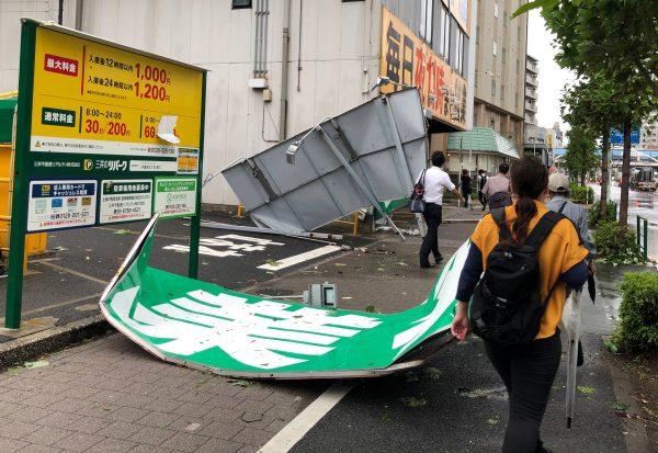 Collapsed steel advertising boards caused by Typhoon Faxai are seen at Edgawa ward in Tokyo, Japan, on Sept 9., 2019. (REUTERS/Kiyoshi Takenaka)