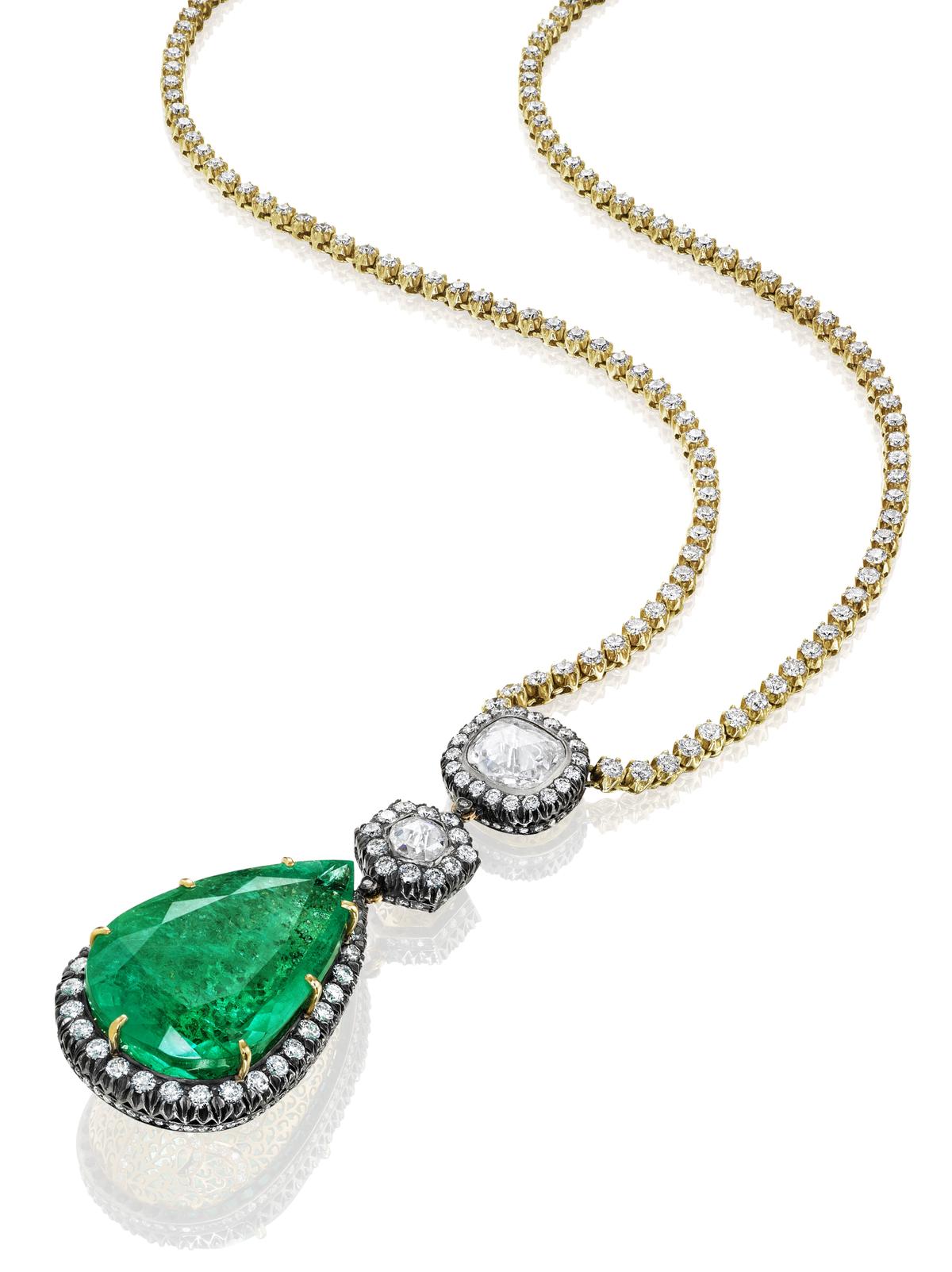 Kunis drop pendant with a pair of 2.5-carat rose-cut diamonds and a 65-carat pear-shaped Colombian emerald, suspended on a line of 12 carats of diamonds. (Courtesy of Sanjay Kasliwal)