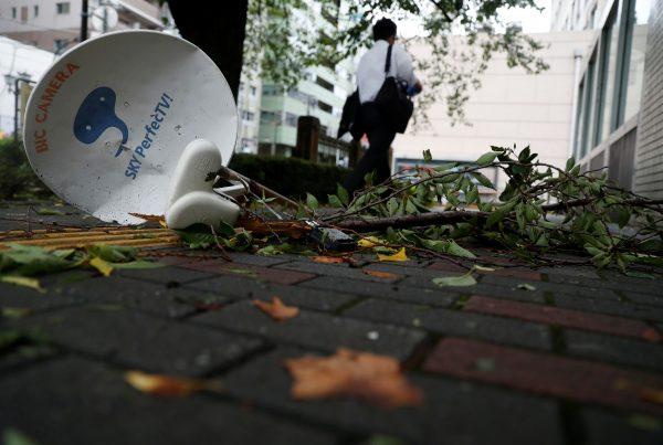 A satellite broadcast television receiving antenna, which was blown away by strong winds caused by Typhoon Faxai, is seen on a street in Tokyo, Japan, on Sept. 9, 2019. (REUTERS/Issei Kato)