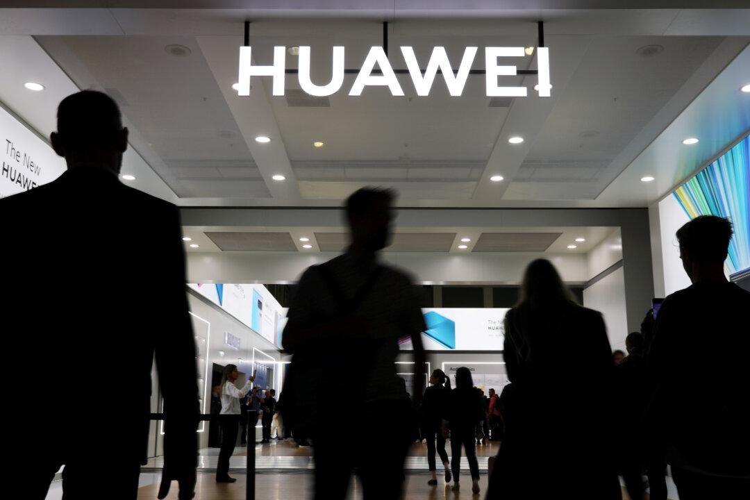 US Charges Chinese Professor in Latest Shot at Huawei
