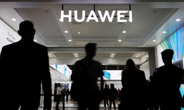 US Charges Chinese Professor in Latest Shot at Huawei