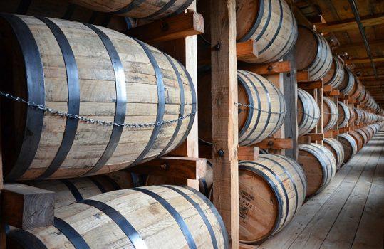 Bourbon aging in a rickhouse. (Wikimedia Commons)