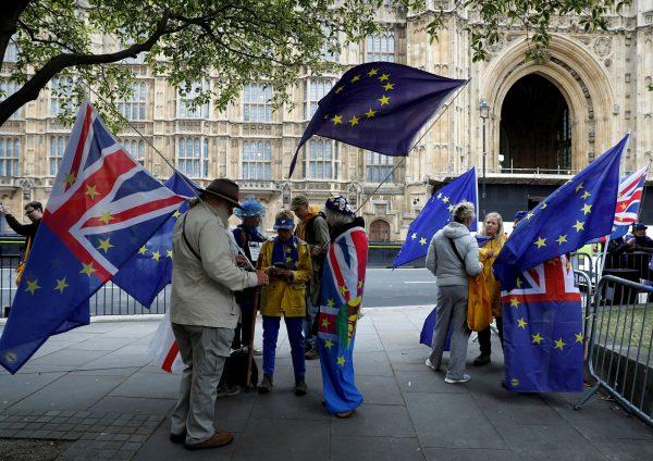 Anti-Brexit protesters demonstrate outside the Houses of Parliament in Westminster in London, Britain, Sept. 9, 2019. (REUTERS/Peter Nicholls)