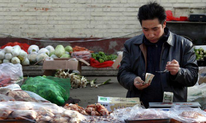 China August Factory Deflation Deepens, Prices Fall Most in Three Years; Pork Prices Soar