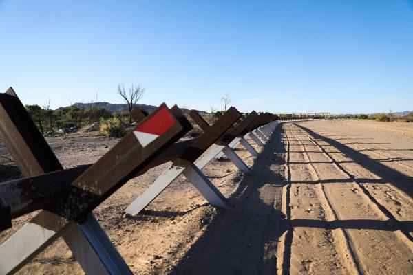 Vehicle barrier is situated near the U.S.-Mexico border by the Colorado River in Yuma, Ariz., on April 13, 2019. (Charlotte Cuthbertson/The Epoch Times)
