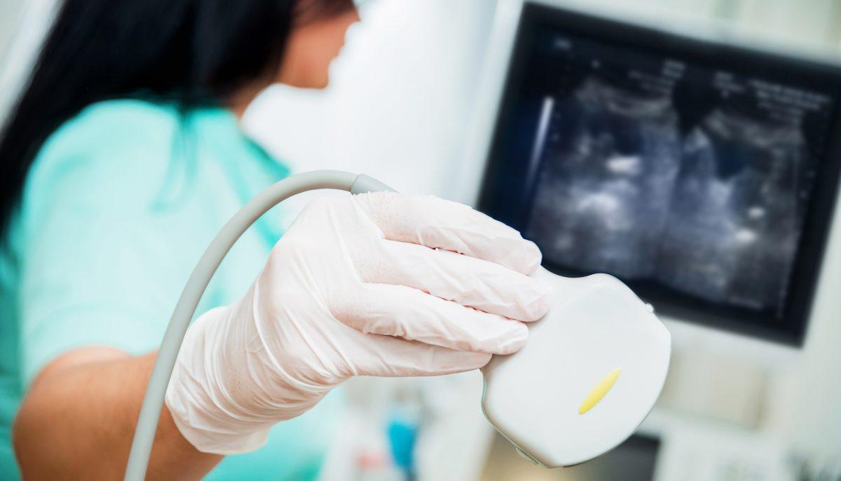 An ultrasound is performed in an illustration photograph. (Illustration - Shutterstock)