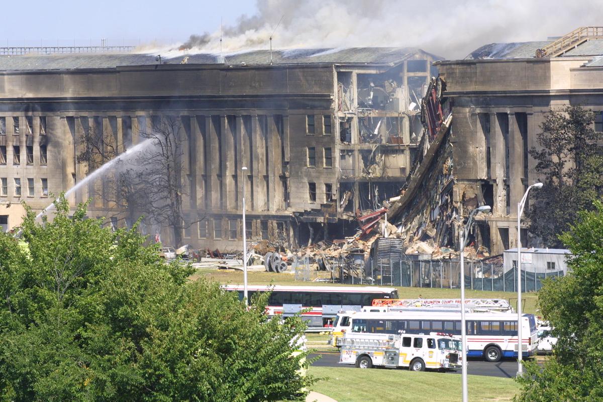 Smoke comes out from the Southwest E-ring of the Pentagon building in Arlington, Virginia, on Sept. 11, 2001, after a hijacked airplane crashed into the building and set off a huge explosion. (Alex Wong/Getty Images)