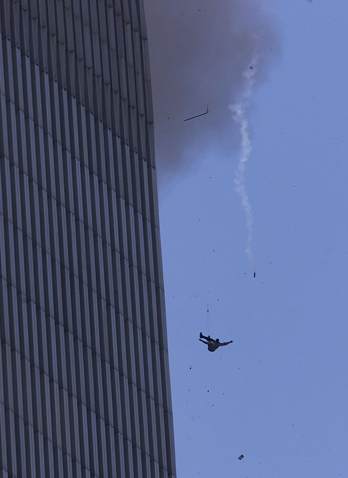 A man falls to his death from the World Trade Center in New York City after two planes hit the building Sept. 11, 2001. (Jose Jimenez/Primera Hora/Getty Images)