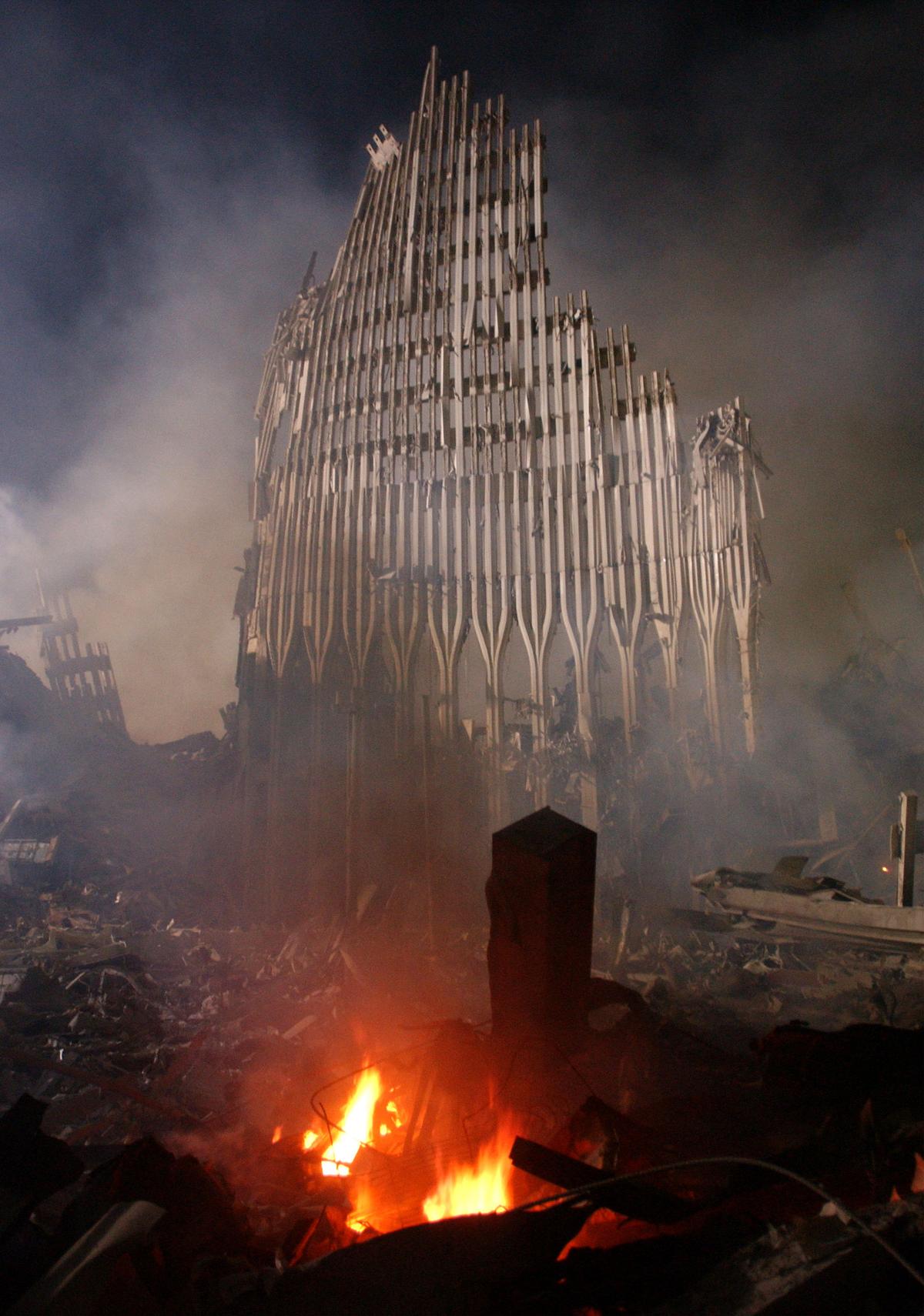 Rubble burns at the remains of the destroyed World Trade Center towers in New York City on Sept. 12, 2001, one day after the twin towers were leveled in a terrorist attack. (Spencer Platt/Getty Images)