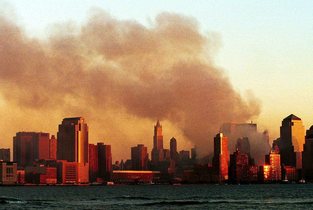 Smoke pours from the former site of the World Trade Center in Manhattan from a vantage point in Hoboken, New Jersey, on Sept. 13, 2001. Smoke filled the air all over lower Manhattan in the aftermath of Tuesday's terrorist attack and destruction of the World Trade Center. (Chris Hondros/Getty Images)