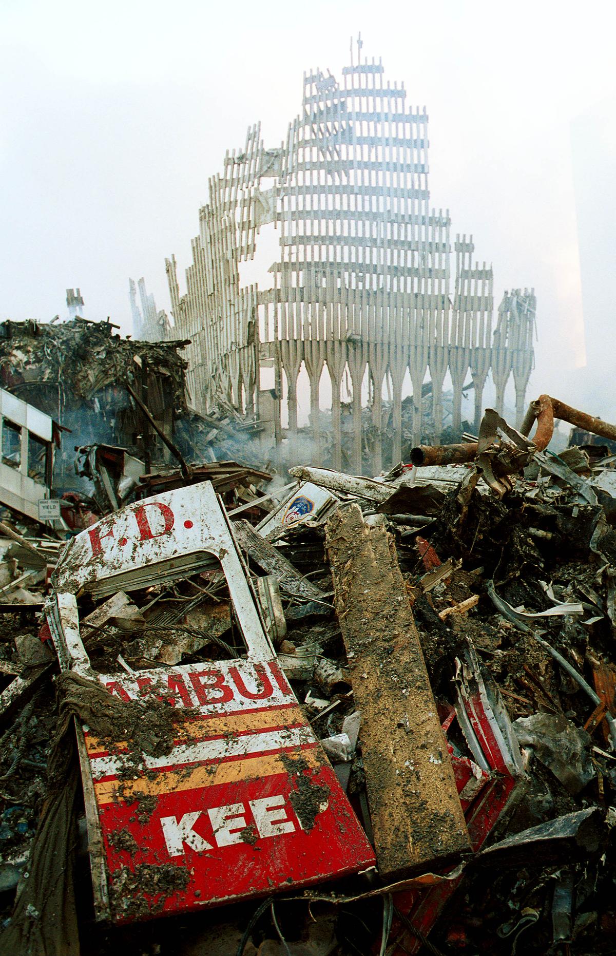 Remnants of a New York City Fire Department vehicle lie in the wreckage of the World Trade Center in New York City on Sept. 13, 2001, two days after the twin towers were destroyed when two hit by two hijacked passenger jets. (Chris Hondros/Getty Images)