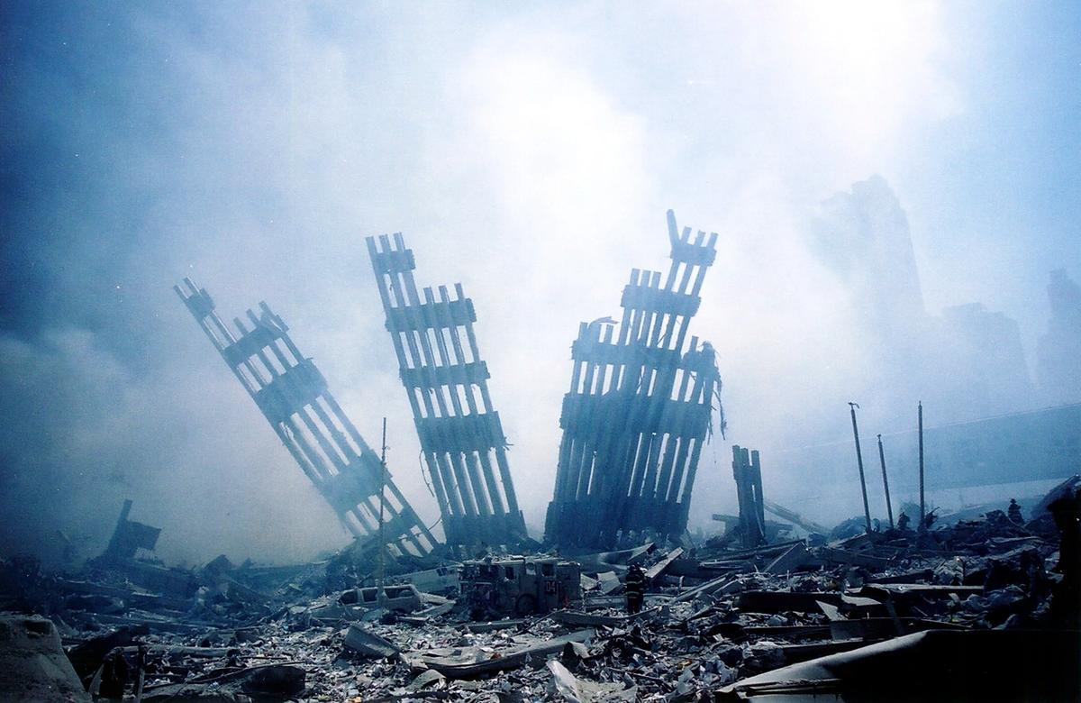 The rubble of the World Trade Center smolders following a terrorist attack in New York on Sept. 11, 2001. A hijacked plane crashed into and destroyed the landmark structure. (Alexandre Fuchs/AFP/Getty Images)